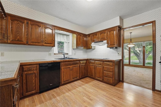 10503 W 50th Ter, Shawnee, KS 66203 - kitchen featuring black appliances, wallpapered walls, under cabinet range hood, a sink, and light wood finished floors