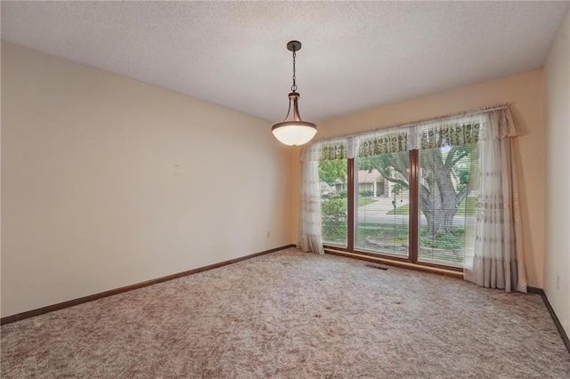10503 W 50th Ter, Shawnee, KS 66203 - unfurnished dining area with carpet, a textured ceiling, and baseboards