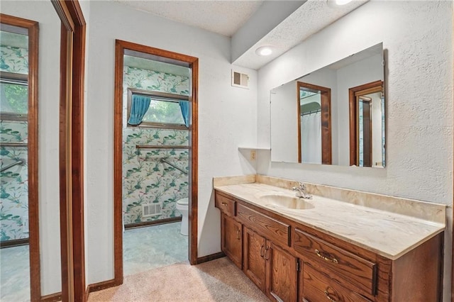 10503 W 50th Ter, Shawnee, KS 66203 - bathroom with vanity, toilet, and baseboards