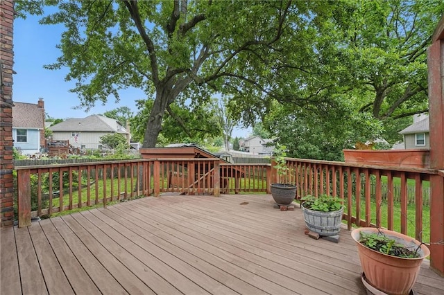 10503 W 50th Ter, Shawnee, KS 66203 - wooden terrace featuring a fenced backyard and a residential view