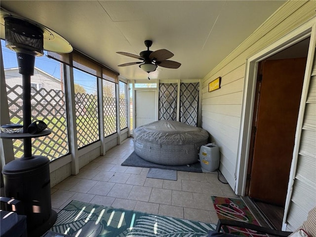 166 Crescent Dr, Chillicothe, MO 64601 - sunroom featuring a ceiling fan