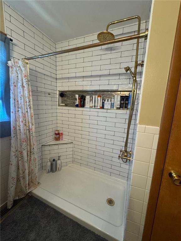 166 Crescent Dr, Chillicothe, MO 64601 - full bathroom featuring tile walls and a stall shower
