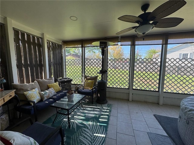 166 Crescent Dr, Chillicothe, MO 64601 - sunroom / solarium with a ceiling fan and an outdoor hangout area