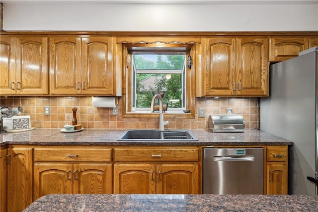 4710 Monrovia St, Shawnee, KS 66216 - kitchen with stainless steel appliances, brown cabinetry, and backsplash