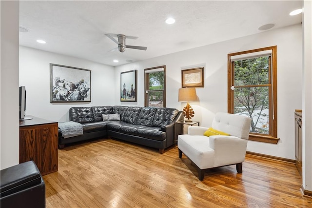 4710 Monrovia St, Shawnee, KS 66216 - living area featuring healthy amount of natural light, a ceiling fan, light wood-style flooring, and recessed lighting
