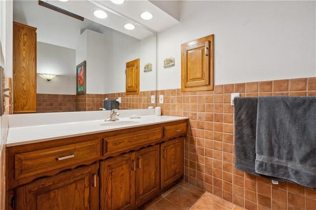 4710 Monrovia St, Shawnee, KS 66216 - bathroom with vanity, tile walls, tile patterned flooring, and wainscoting