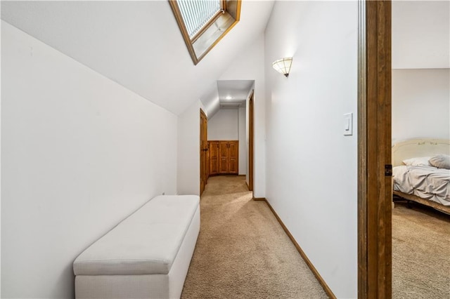 4710 Monrovia St, Shawnee, KS 66216 - corridor featuring light carpet and vaulted ceiling