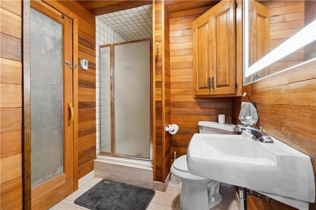 4710 Monrovia St, Shawnee, KS 66216 - bathroom with wood walls and a stall shower