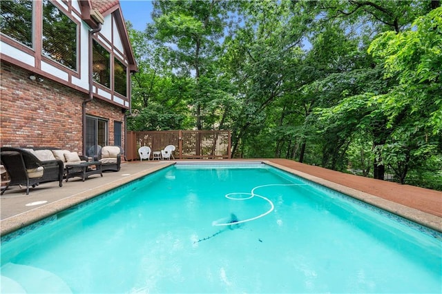 4710 Monrovia St, Shawnee, KS 66216 - view of swimming pool featuring outdoor lounge area and view of scattered trees