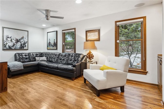 4710 Monrovia St, Shawnee, KS 66216 - living room with light wood finished floors, ceiling fan, and recessed lighting