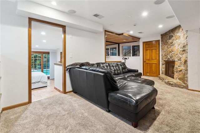 4710 Monrovia St, Shawnee, KS 66216 - living area featuring light colored carpet, recessed lighting, and a fireplace