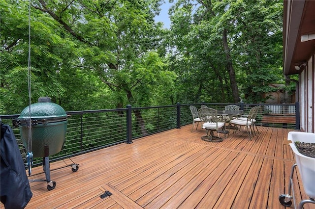4710 Monrovia St, Shawnee, KS 66216 - wooden deck featuring outdoor dining area and grilling area