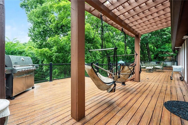 4710 Monrovia St, Shawnee, KS 66216 - deck with a grill, view of scattered trees, and a pergola