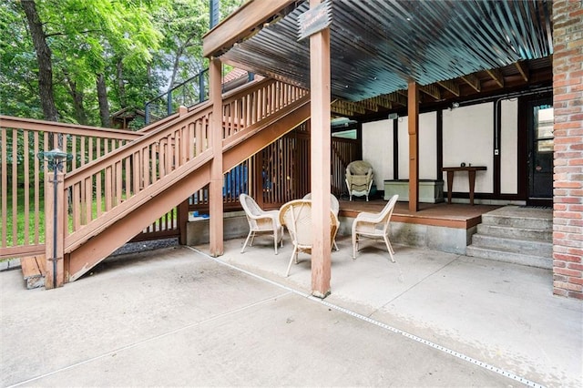 4710 Monrovia St, Shawnee, KS 66216 - view of patio with stairway and a wooden deck