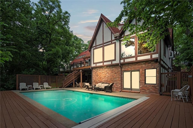 4710 Monrovia St, Shawnee, KS 66216 - outdoor pool with stairs, an outdoor hangout area, and a deck