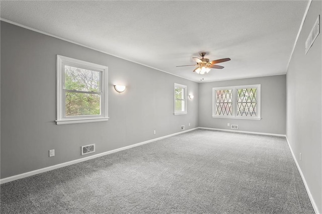 8416 Westridge Rd, Raytown, MO 64138 - carpeted empty room with visible vents, ceiling fan, and baseboards