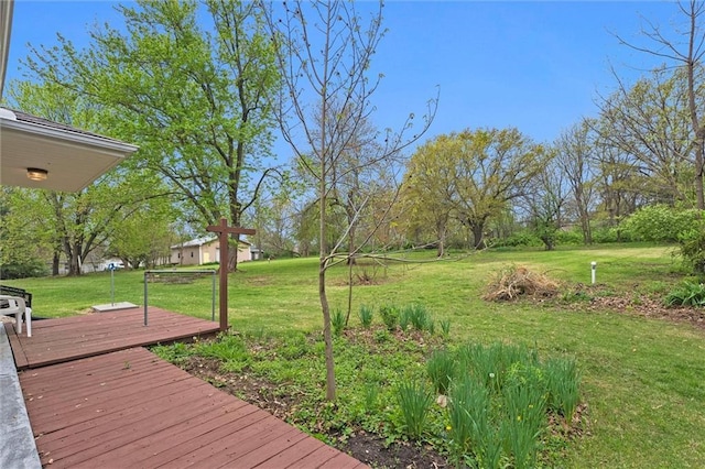 8416 Westridge Rd, Raytown, MO 64138 - wooden terrace featuring a yard
