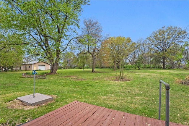 8416 Westridge Rd, Raytown, MO 64138 - deck featuring a yard and a garage