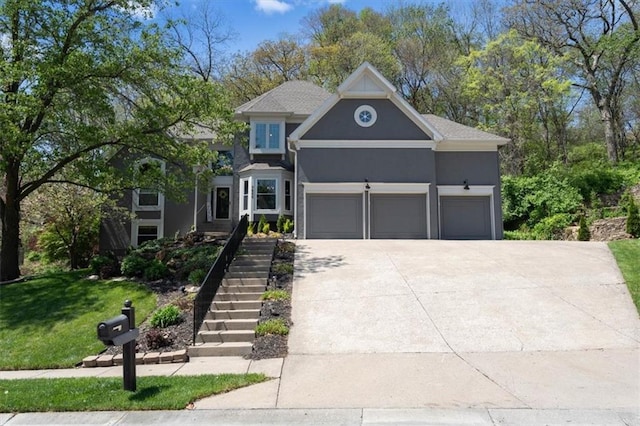 view of front facade with stucco siding, a garage, a front lawn, concrete driveway, and stairs