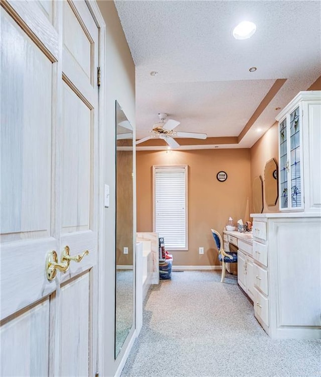 521 W Sugar Lake Dr, Mound City, KS 66056 - office featuring ceiling fan, light colored carpet, and a textured ceiling