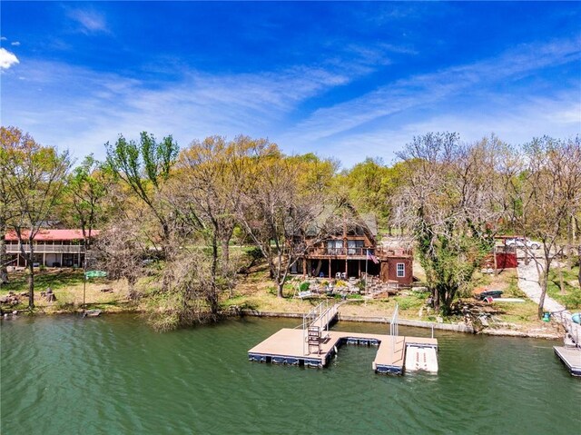 521 W Sugar Lake Dr, Mound City, KS 66056 - dock featuring a water view