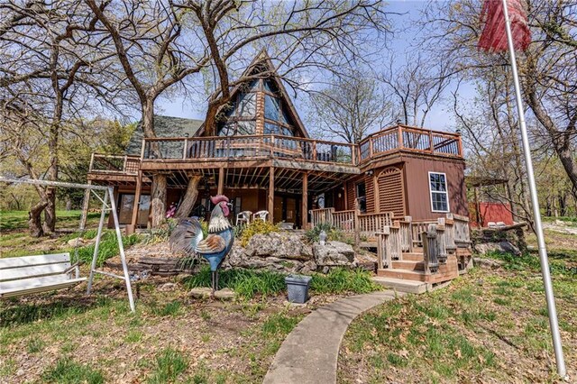 521 W Sugar Lake Dr, Mound City, KS 66056 - rear view of house featuring a deck