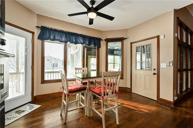 4353 NW State Route Ff, Adrian, MO 64720 - dining area featuring wood finished floors, a ceiling fan, and baseboards