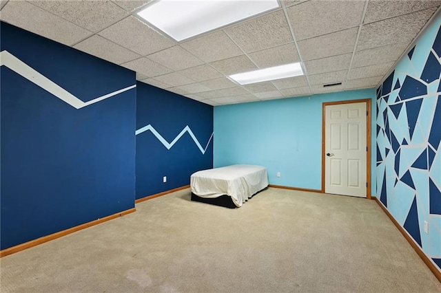 4353 NW State Route Ff, Adrian, MO 64720 - unfurnished bedroom featuring baseboards, carpet, and a drop ceiling