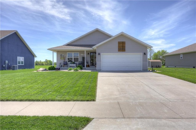 ranch-style home with a porch, a garage, driveway, and a front yard