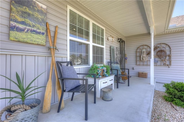 view of patio featuring a porch