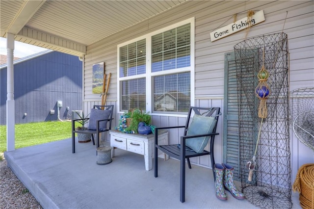 view of patio featuring a porch