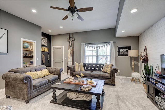 living room featuring carpet floors, ceiling fan, baseboards, and recessed lighting