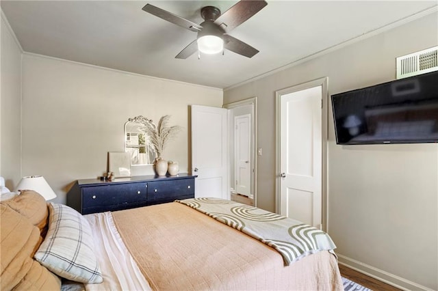 2014 W 74th St, Prairie Village, KS 66208 - bedroom featuring wood finished floors, ornamental molding, baseboards, and ceiling fan