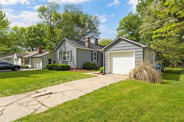 2014 W 74th St, Prairie Village, KS 66208 - single story home featuring driveway, a front lawn, a chimney, and a detached garage