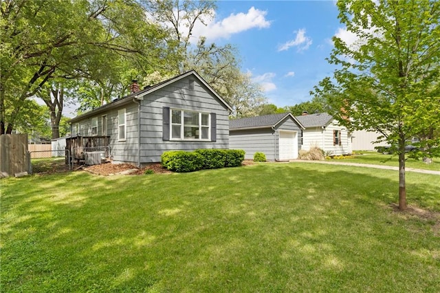 2014 W 74th St, Prairie Village, KS 66208 - ranch-style house with central air condition unit, a chimney, and a garage