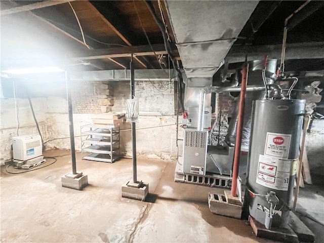 628 S Clay St, Nevada, MO 64772 - unfinished basement with water heater