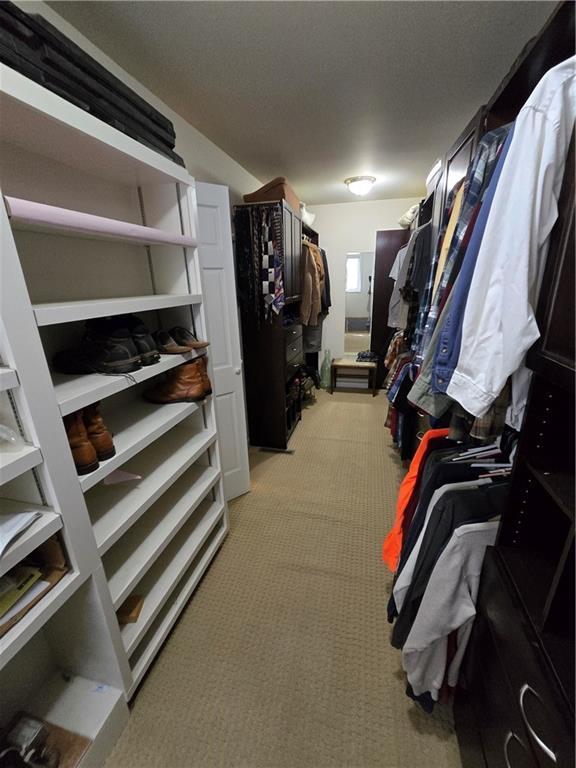1502 Hillcrest Ct, Atchison, KS 66002 - spacious closet with light carpet
