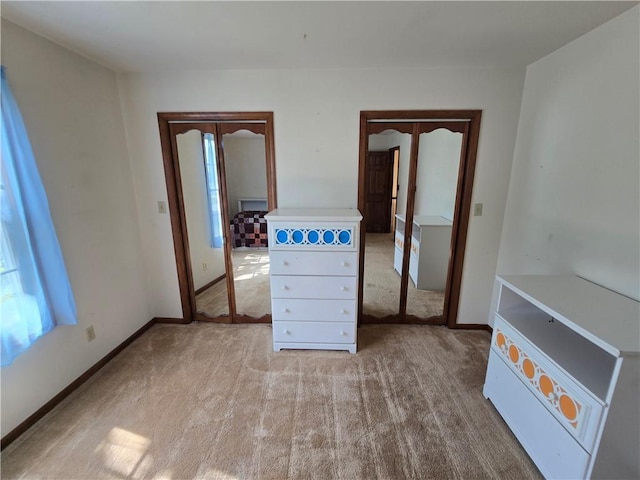 1502 Hillcrest Ct, Atchison, KS 66002 - carpeted empty room featuring plenty of natural light and baseboards