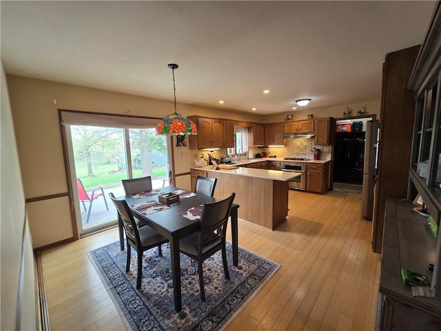 1502 Hillcrest Ct, Atchison, KS 66002 - dining room featuring recessed lighting and light wood-style floors