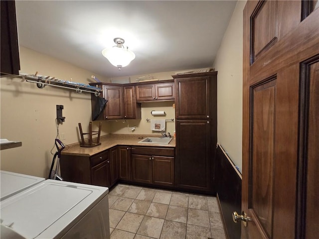 1502 Hillcrest Ct, Atchison, KS 66002 - washroom with cabinet space, separate washer and dryer, and light tile patterned floors