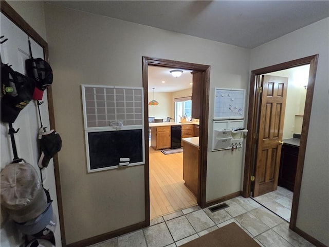 1502 Hillcrest Ct, Atchison, KS 66002 - hall featuring light tile patterned flooring