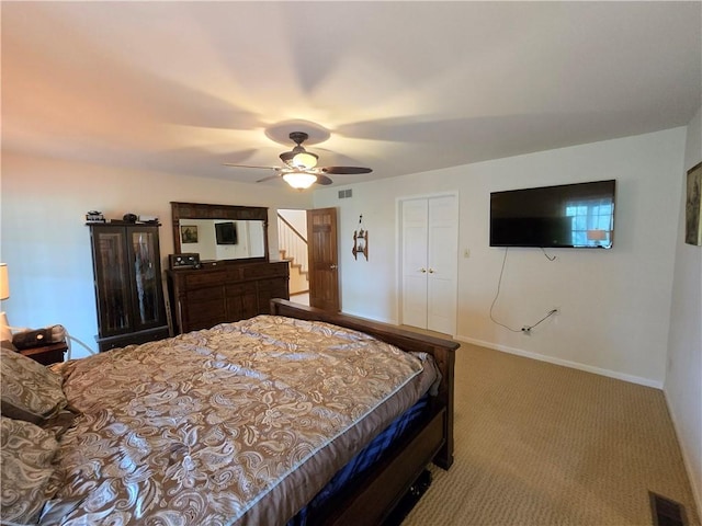 1502 Hillcrest Ct, Atchison, KS 66002 - carpeted bedroom with baseboards and ceiling fan