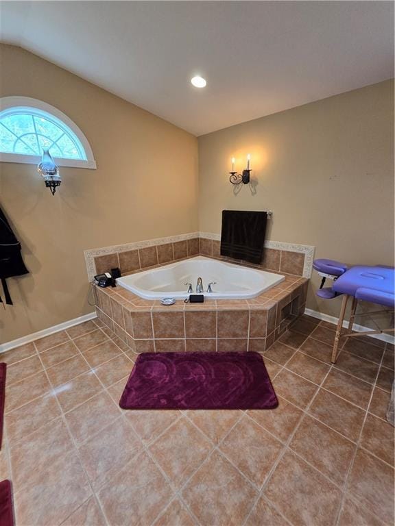1502 Hillcrest Ct, Atchison, KS 66002 - full bath featuring a garden tub, tile patterned floors, baseboards, vaulted ceiling, and recessed lighting