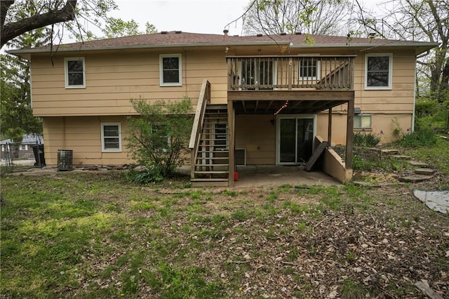 back of house with central AC, stairway, a patio area, and a wooden deck