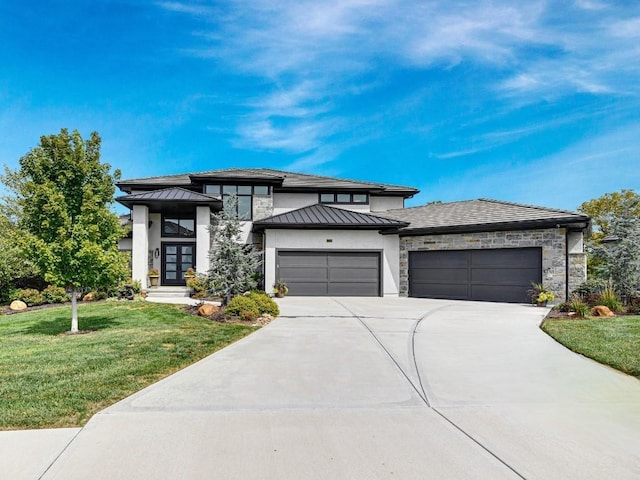 25260 W 104th Pl, Olathe, KS 66061 - prairie-style house with an attached garage, a standing seam roof, a front lawn, stone siding, and concrete driveway