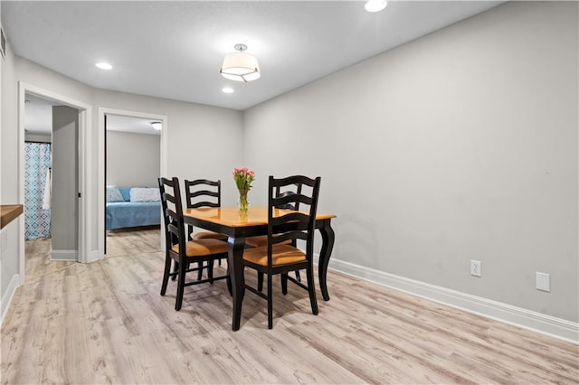 5510 W 153rd Ter, Overland Park, KS 66223 - dining area with light wood-style flooring, baseboards, and recessed lighting