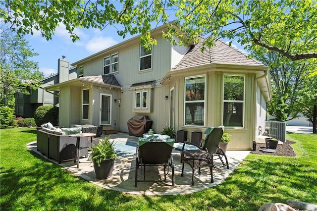 5510 W 153rd Ter, Overland Park, KS 66223 - back of house featuring outdoor lounge area, a lawn, a patio area, and central AC unit