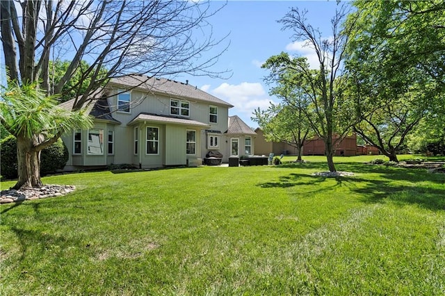 5510 W 153rd Ter, Overland Park, KS 66223 - rear view of house with a yard