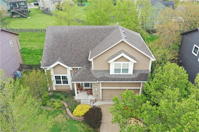 18716 W 164th Ter, Olathe, KS 66062 - view of front facade with a shingled roof and a garage