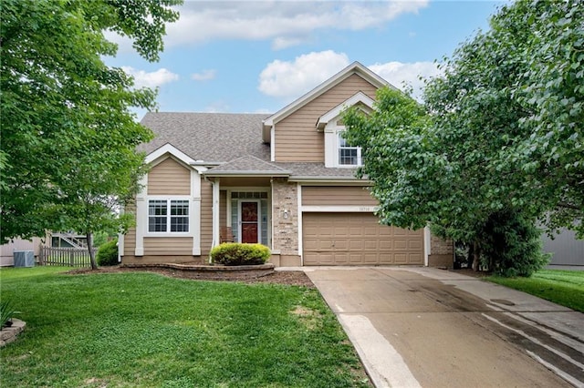 18716 W 164th Ter, Olathe, KS 66062 - traditional home with driveway, a garage, and a shingled roof